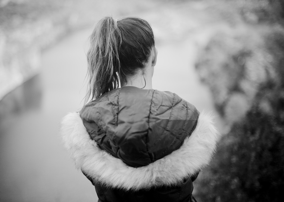 Image of a girl with her back turned