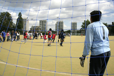 Children playing football photograph