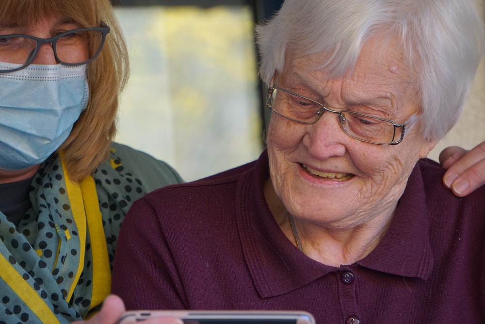 Two people using technology to communicate